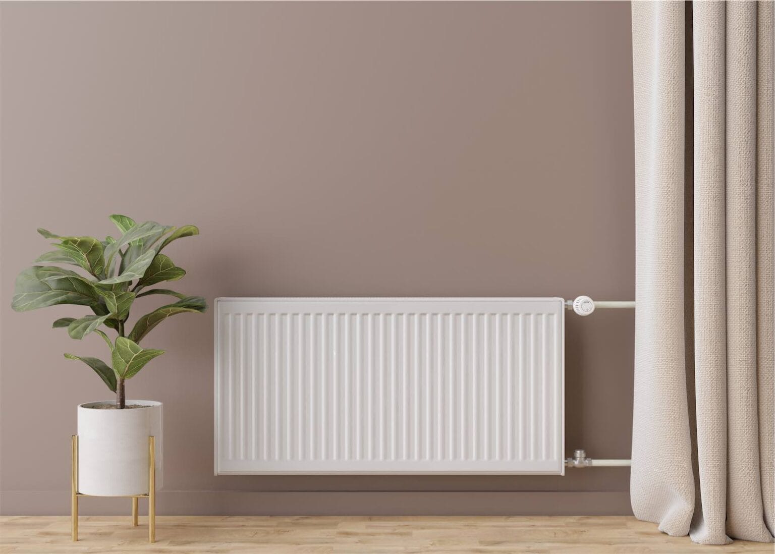 white-heating-radiator-with-thermostat-on-brown-wa-2022-11-16-12-22-12-utc